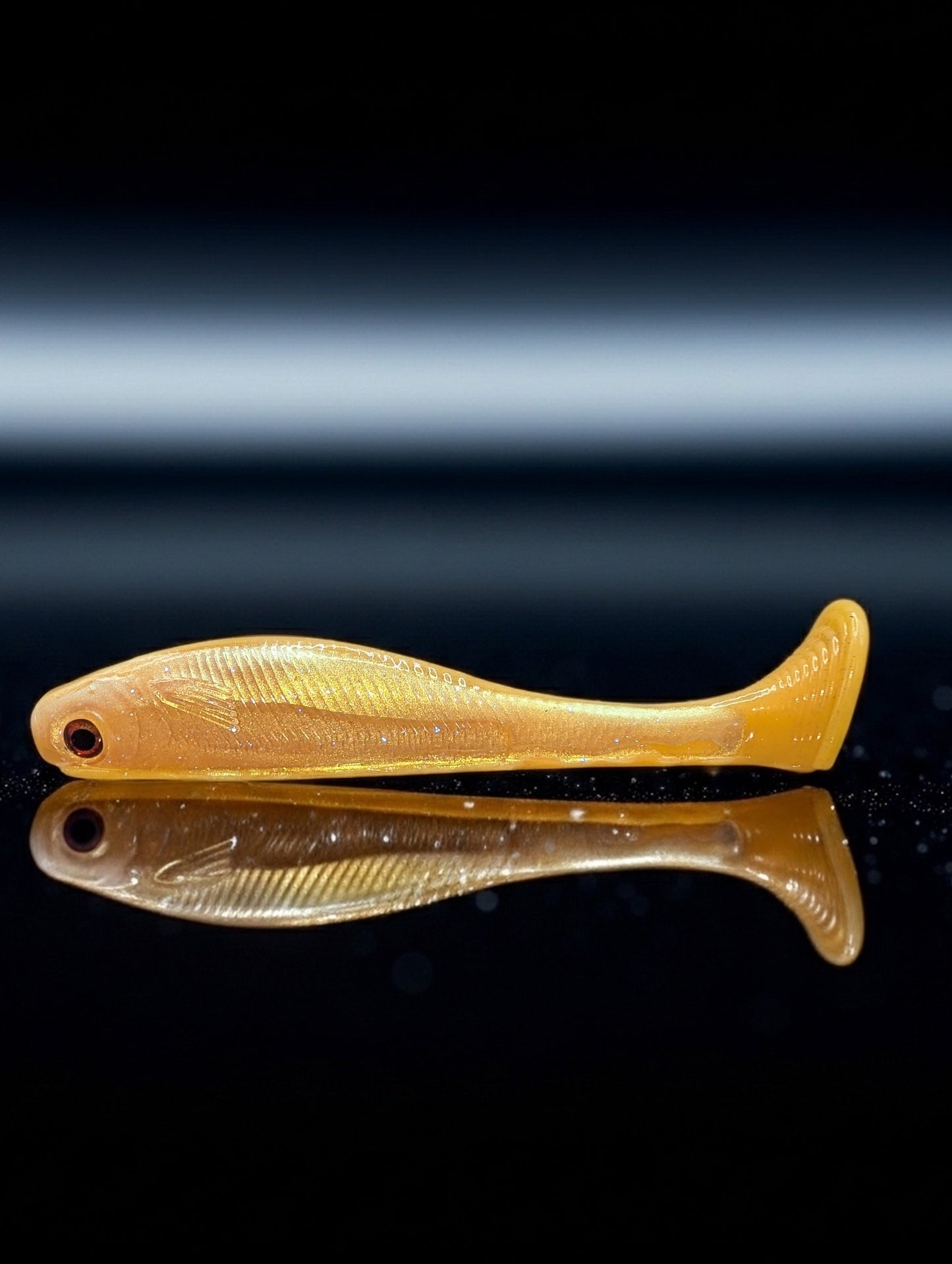 7" Holographic Pumpkin Spice Paddle Tail Swimbait