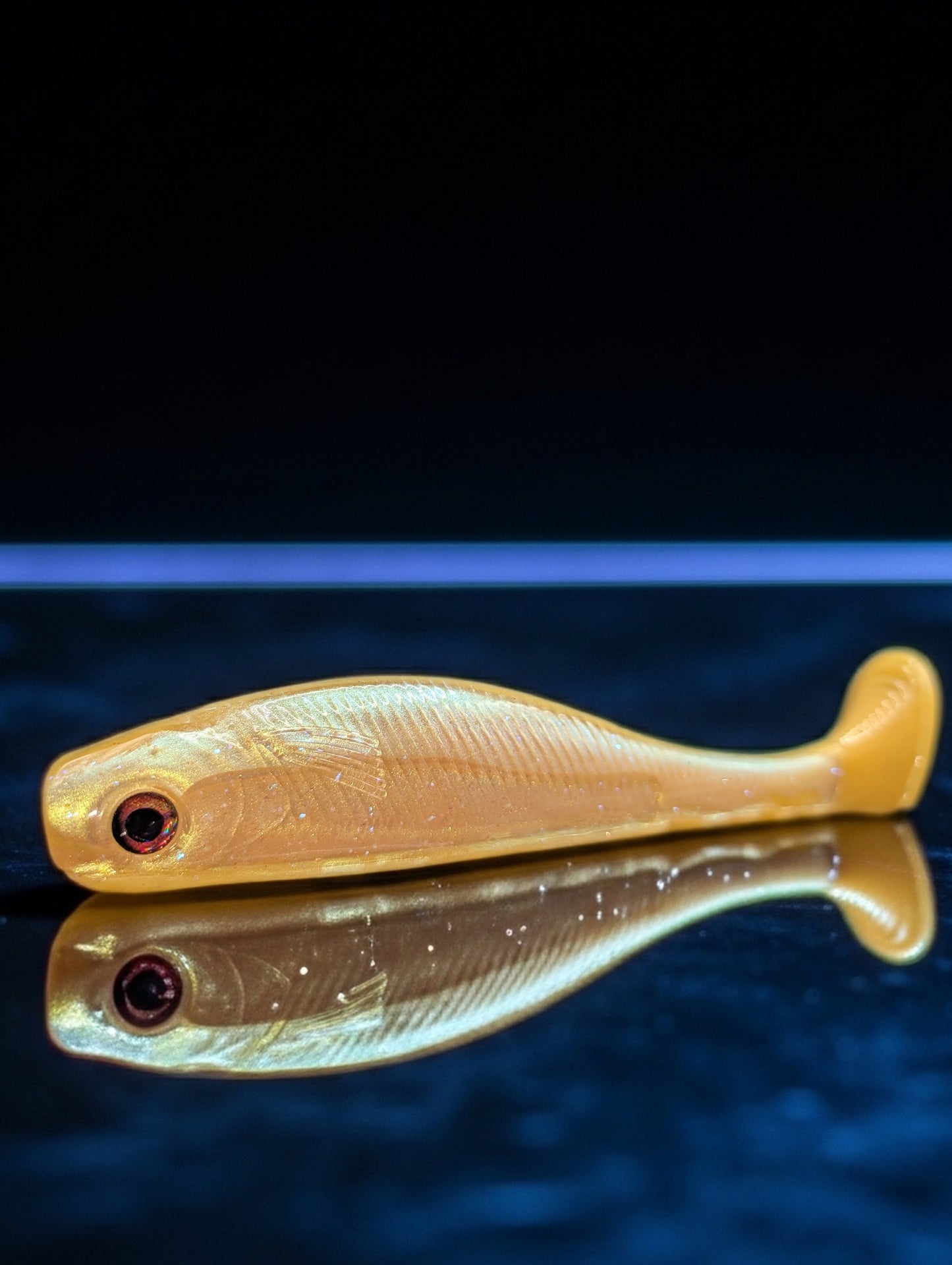 7" Holographic Pumpkin Spice Paddle Tail Swimbait